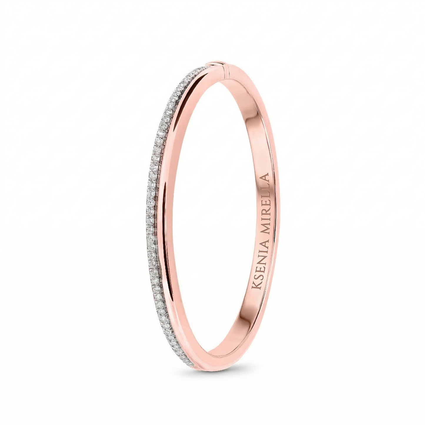 Rose gold diamond bangle accents on a white background