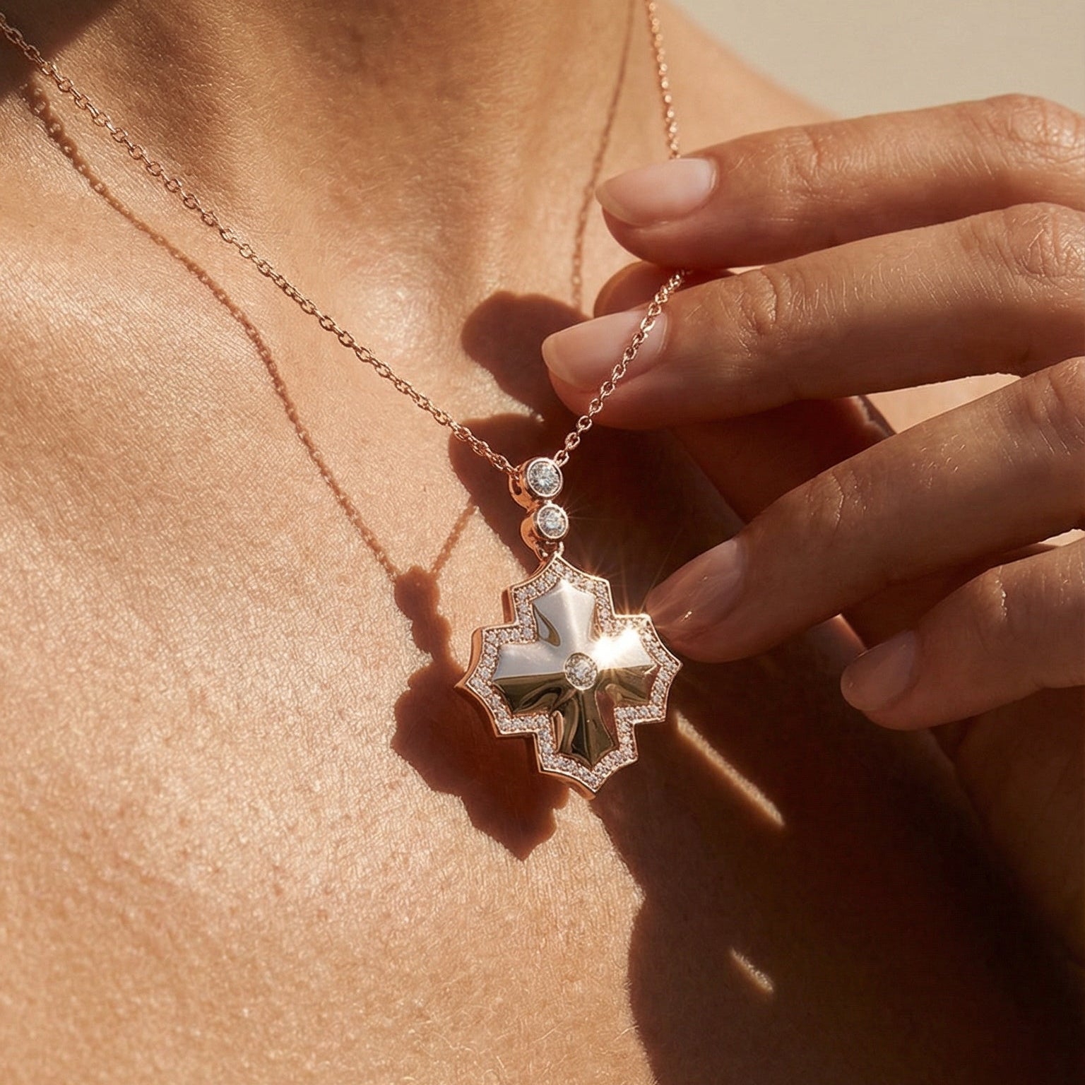 rose god  necklace with a star-shaped pendant on a person's neck