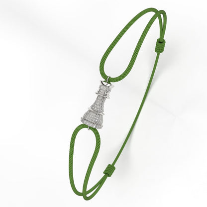 A Silver bracelet with white diamond pavé accents, featuring a green cord-style fastening.