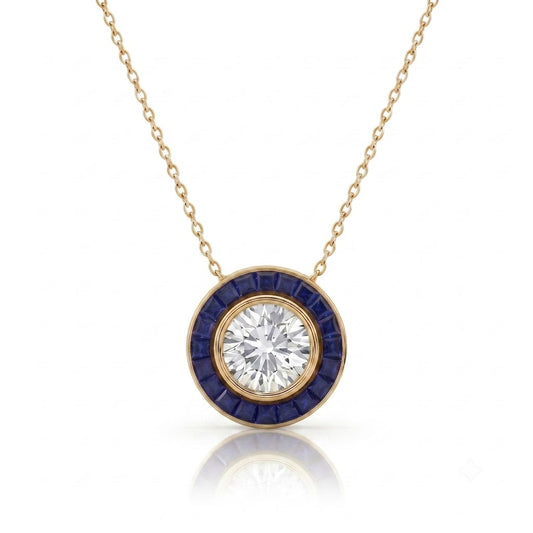 A gold pendant necklace featuring a round bezel-set diamond surrounded by a halo of deep blue sapphires, displayed on a clean white background with a soft reflection.