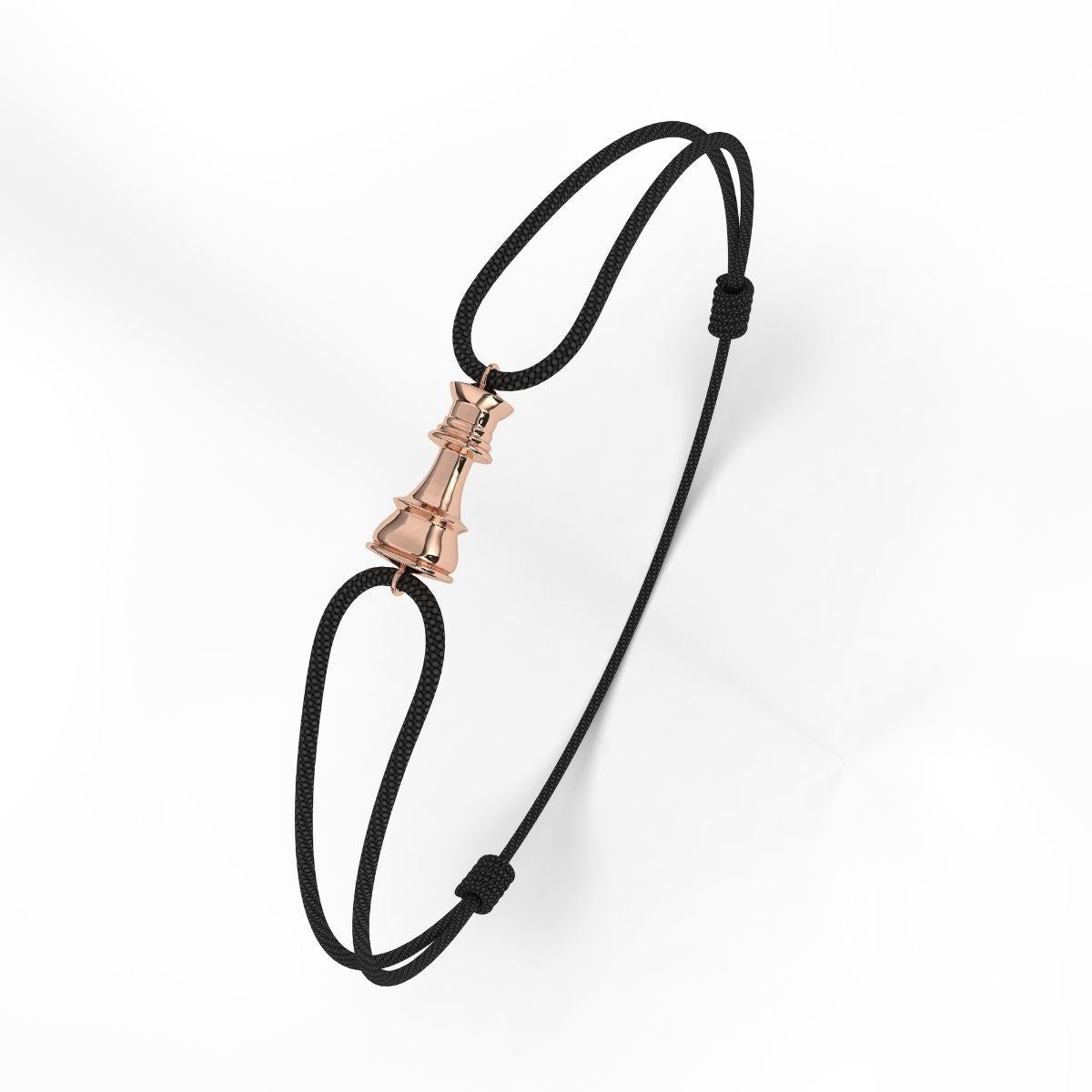 A rose gold bracelet with a geometric patterned clasp, attached to a black cord.