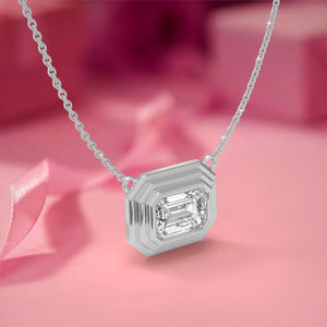 White gold white diamond emerald cut necklace 