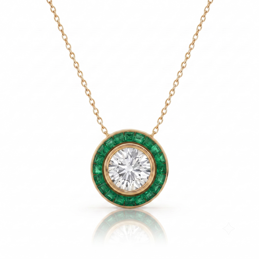 A gold pendant necklace featuring a round-cut clear center stone surrounded by a halo of round green emerald-cut stones, suspended from a delicate gold chain on a white background.