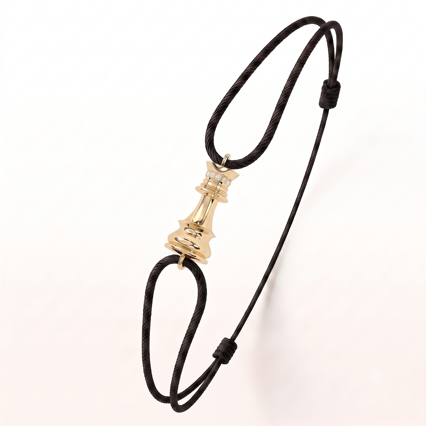 A black adjustable cord bracelet featuring a polished gold chess piece motif, displayed on a clean white background.