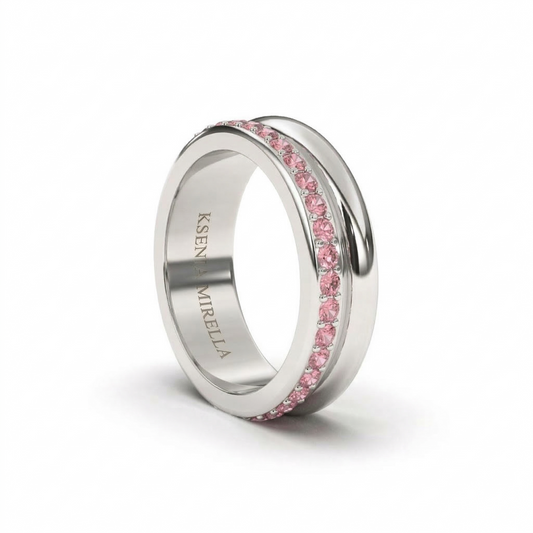 White gold pink sapphire full eternity ring wedding band on a white background 