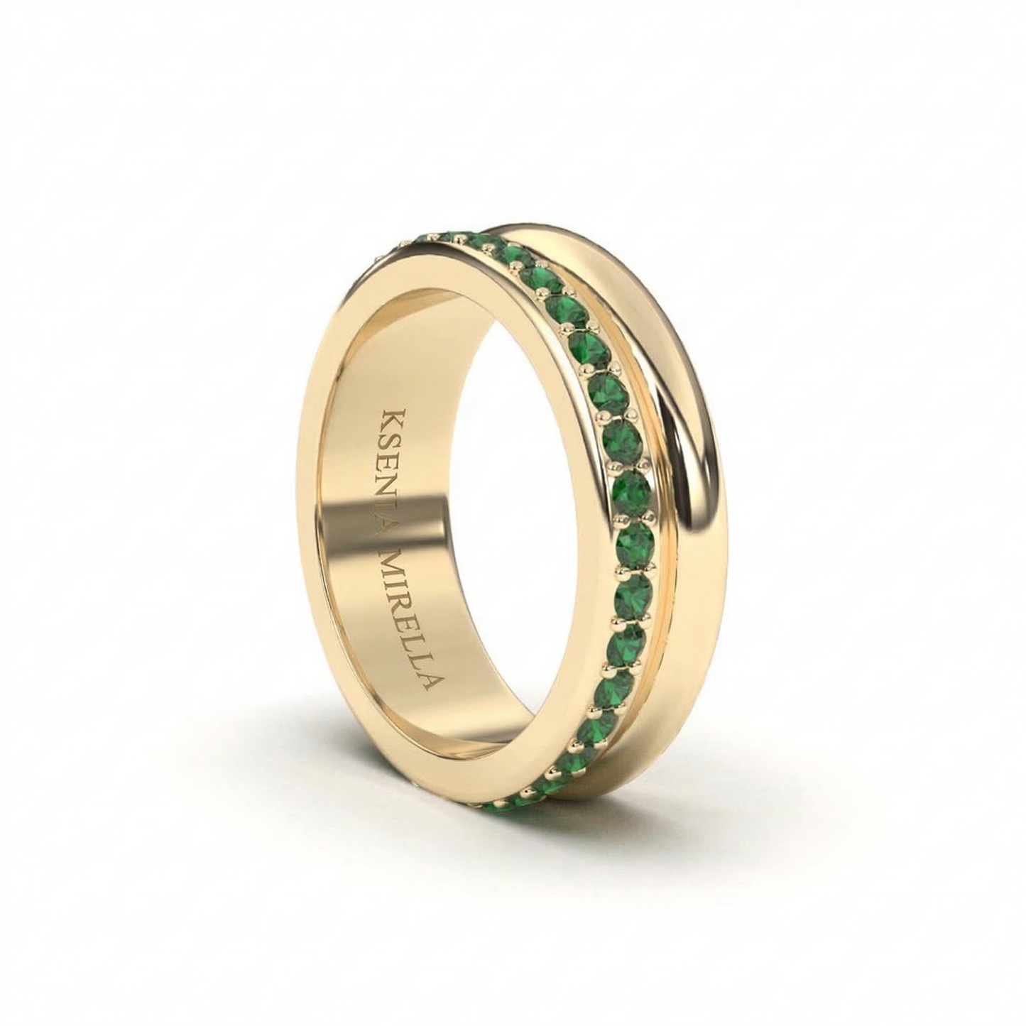 Yellow gold full eternity band ring with round emerald stones on white background, perfect stacking ring