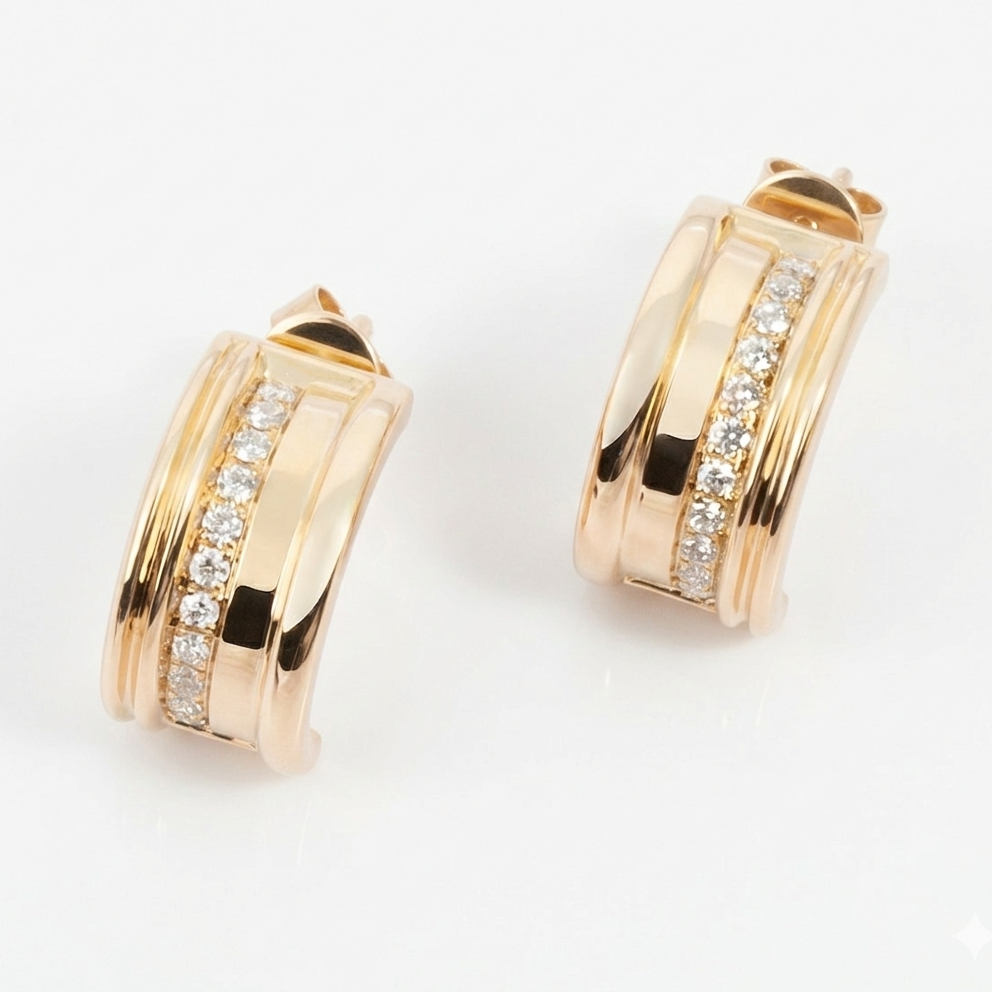 Gold hoop earrings with diamond accents on a white background
