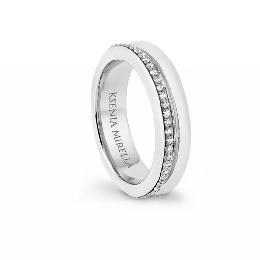 White Gold ring with embedded stones on a white background