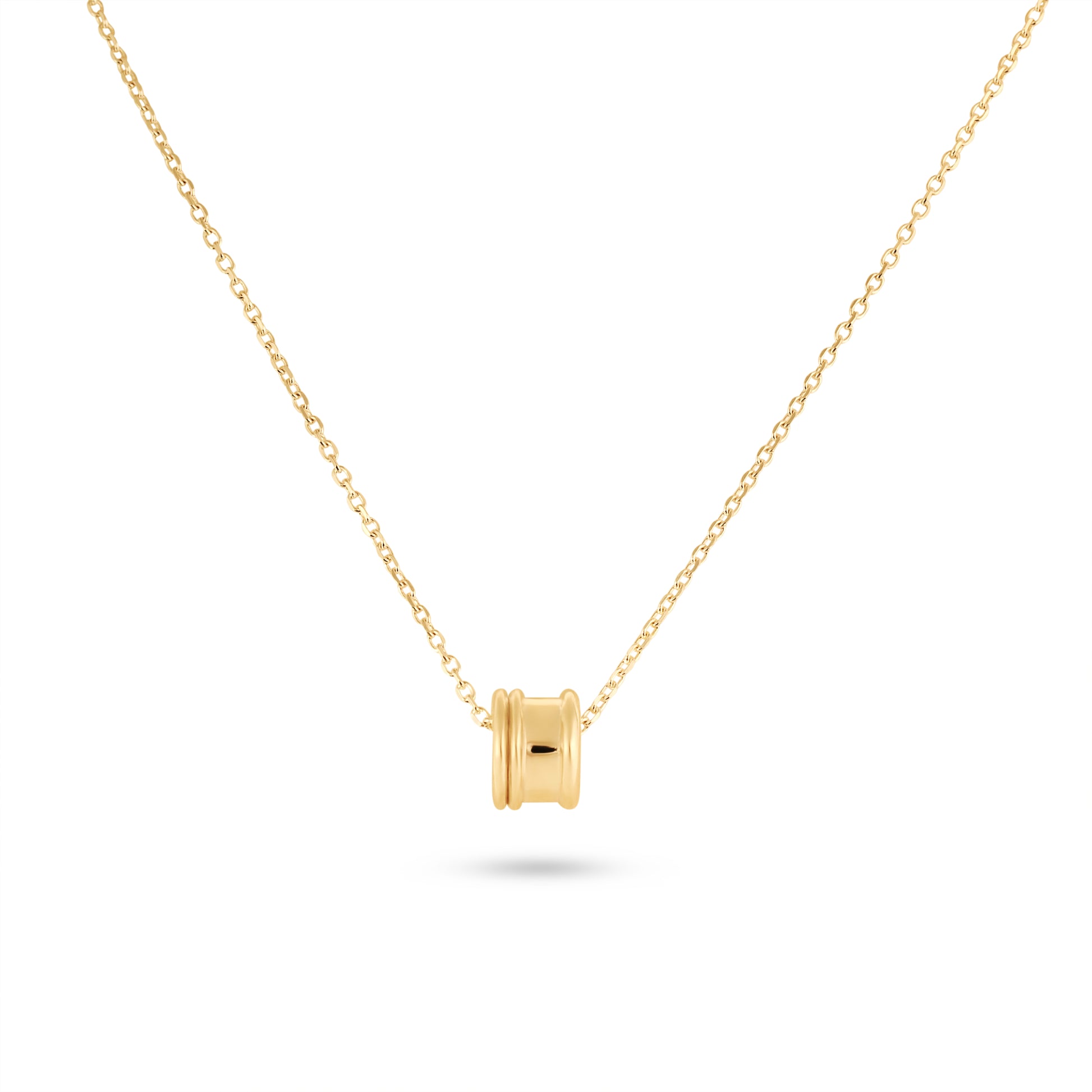 Gold necklace with a small square pendant on a white background