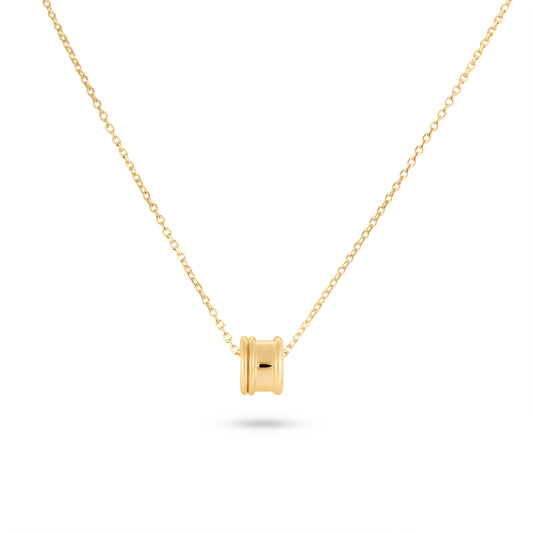 Gold necklace with a small square pendant on a white background