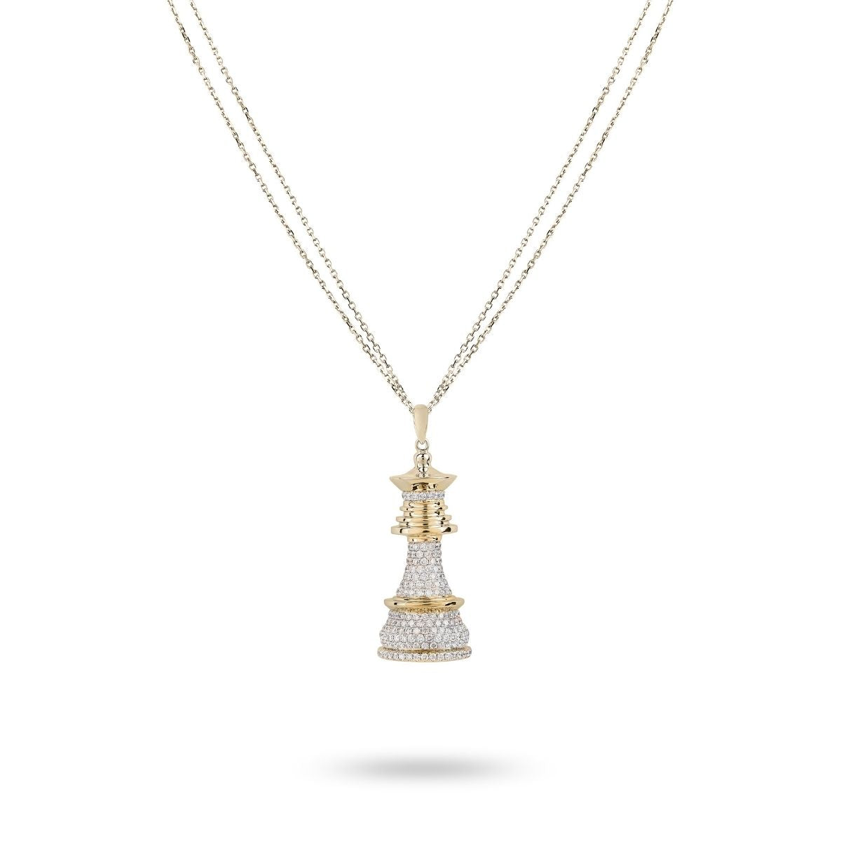A yellow gold necklace featuring a chess piece pendant adorned with white diamonds.