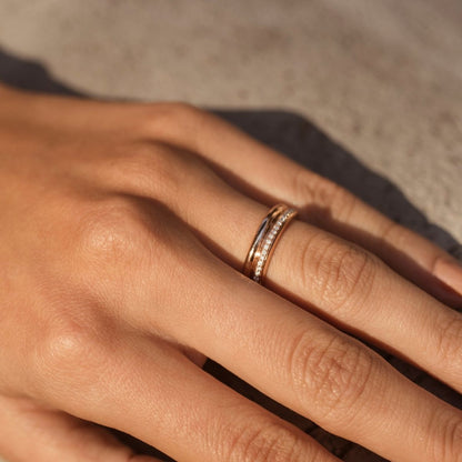 Prima Rose Gold White Diamond Ring by Ksenia Mirella Jewellery worn on hand in warm natural light