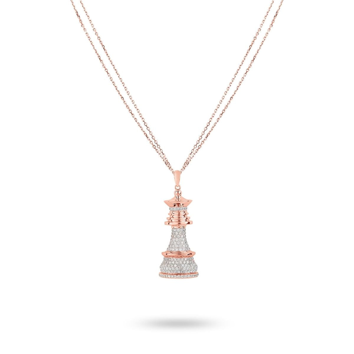 A rose gold necklace with white diamond accents, featuring a double chain design and a pendant with a diamond-encrusted structure.