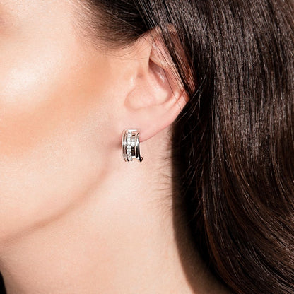 White gold diamond hoop earring by Ksenia Mirella Jewellery worn in close-up side profile