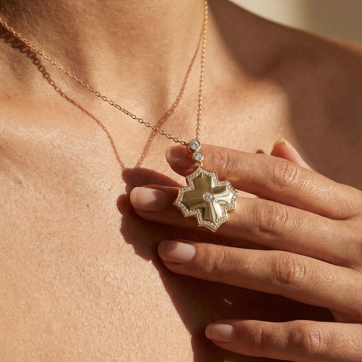 modern yellow gold white diamond statement necklace worn by a model 