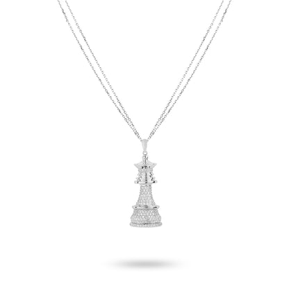 A white gold necklace featuring a chess piece pendant adorned with white diamonds.