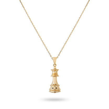 A yellow gold chess necklace with a pendant featuring the queen piece on a chain.